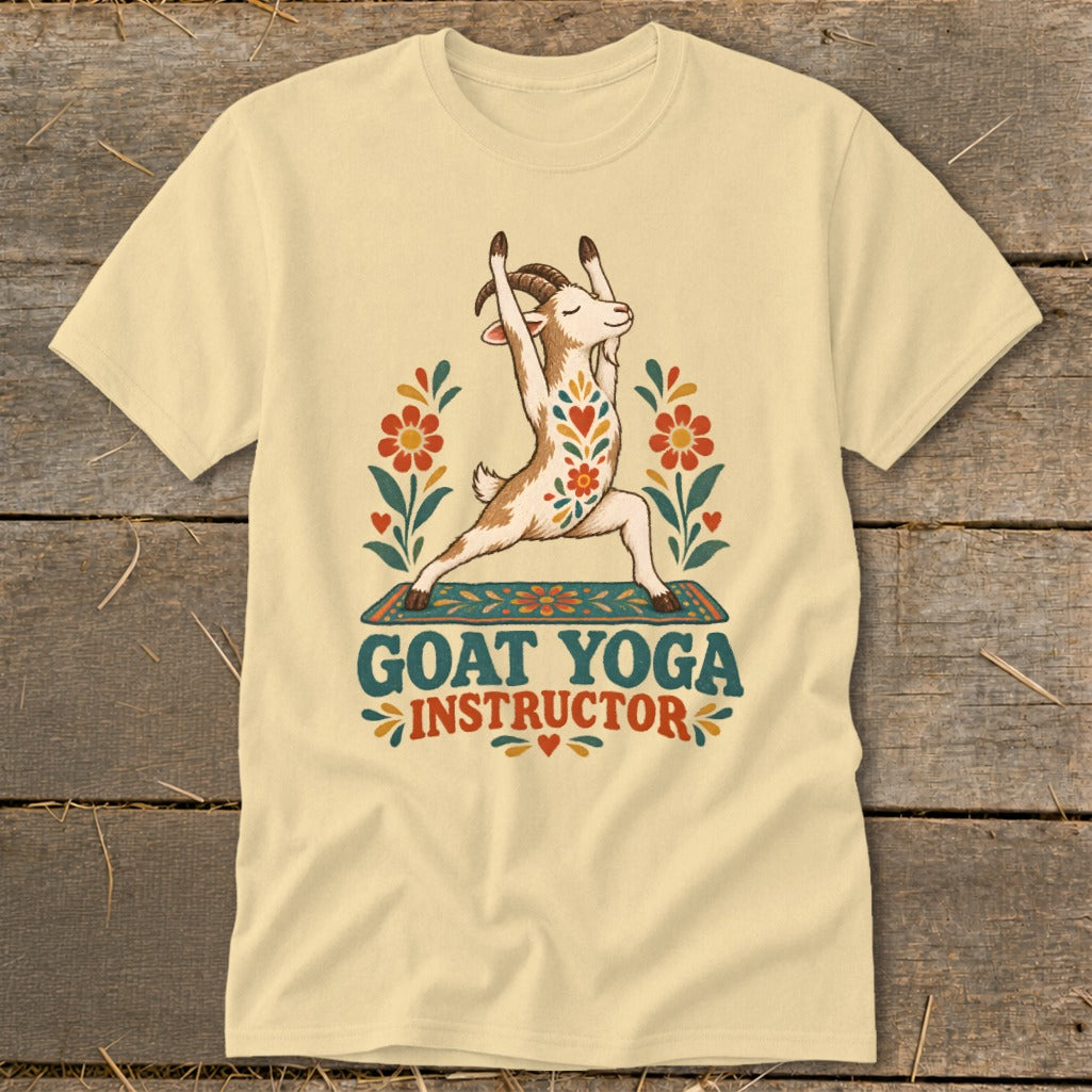 T-shirt with a goat doing a yoga pose, surrounded by flowers and text.