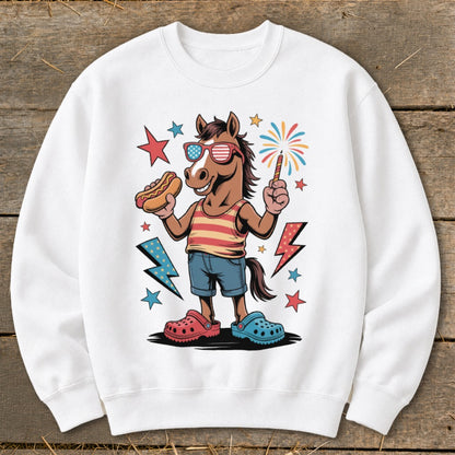 Cartoon horse in sunglasses holds hot dog and sparkler with fireworks.