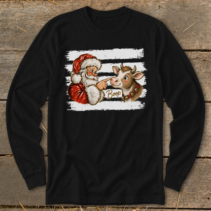 Santa Claus pointing at a cow's nose with "Boop" text.