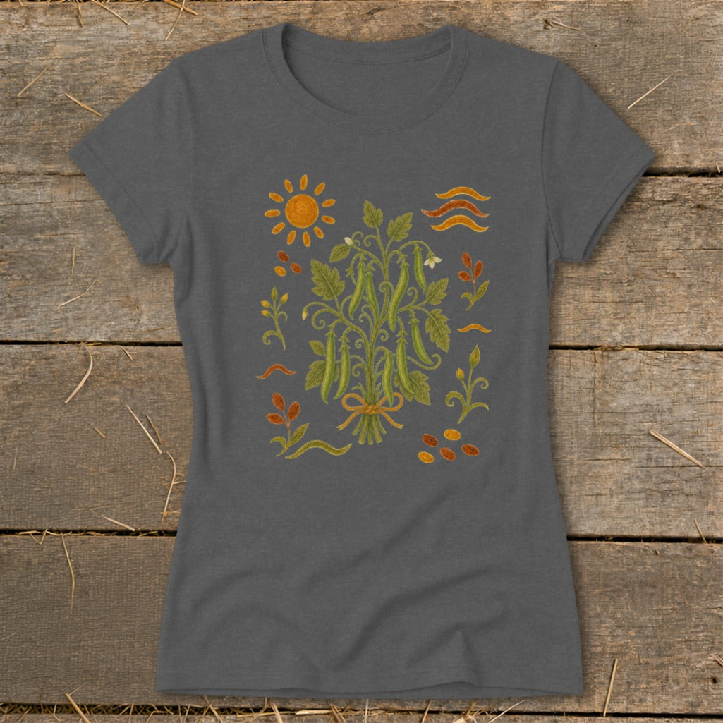 T-shirt with a central illustration of a bean plant and surrounding garden motifs.