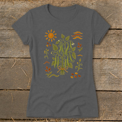 T-shirt with a central illustration of a bean plant and surrounding garden motifs.