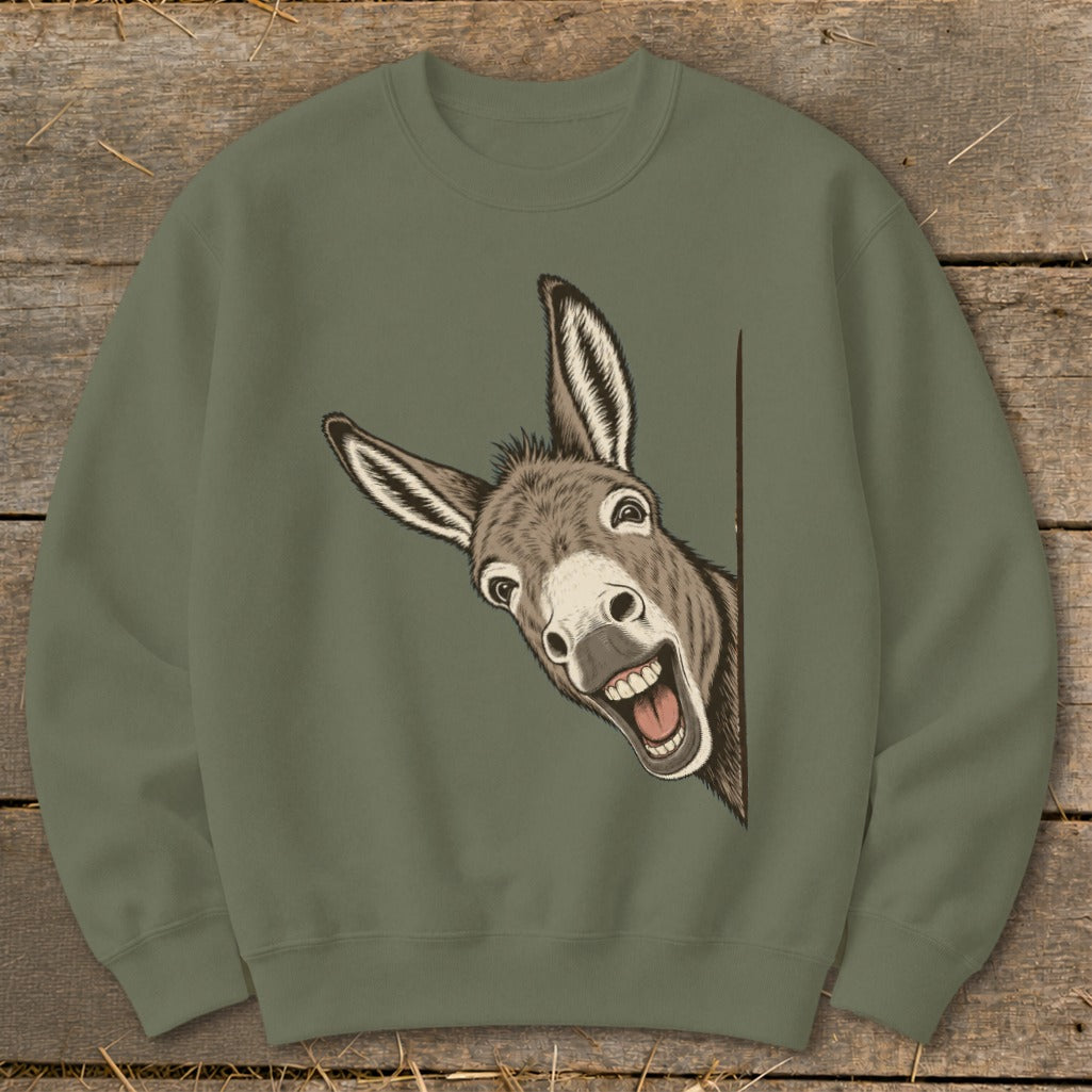 Green sweatshirt with a humorous drawing of a donkey peeking out from the side.