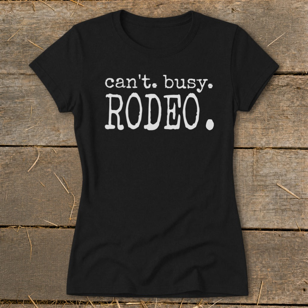 Black t-shirt with white text that reads "can't. busy. RODEO."