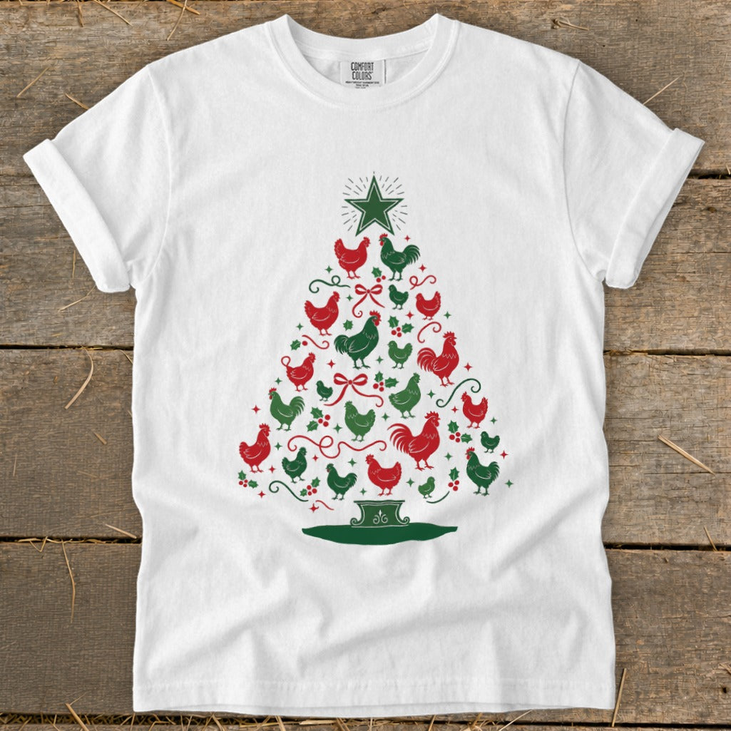 White t-shirt with a Christmas tree graphic made of red and green chickens.