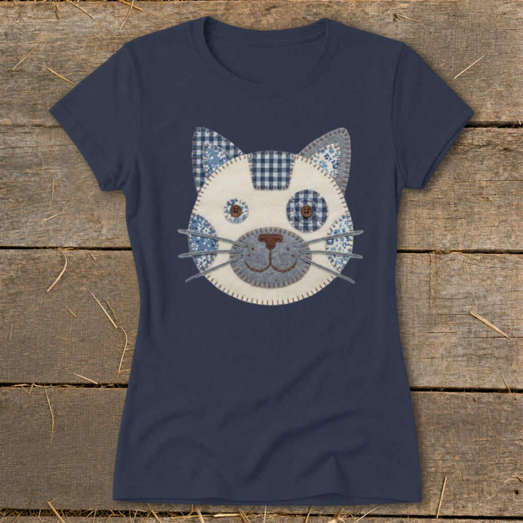 Navy t-shirt with a quilted patchwork cat face design on the front.