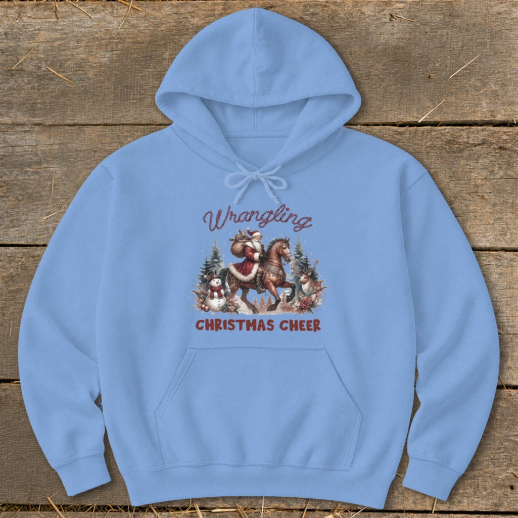 Light blue hoodie with "Wrangling Christmas Cheer" graphic featuring Santa on horseback