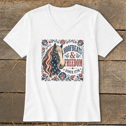 Horse with American flag mane, "Hoofbeats & Freedom Since 1776" text, floral border.