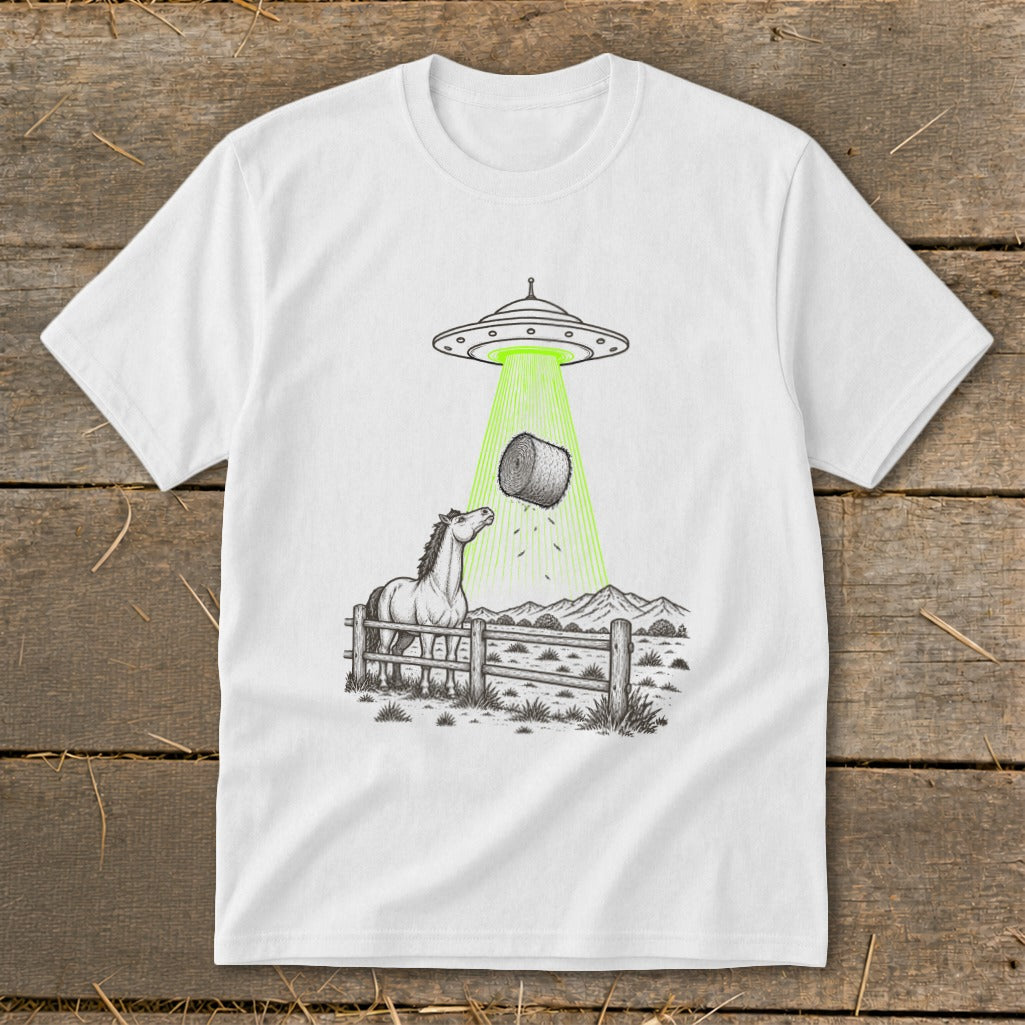 UFO abducting a hay bale over a horse and fence in a field.