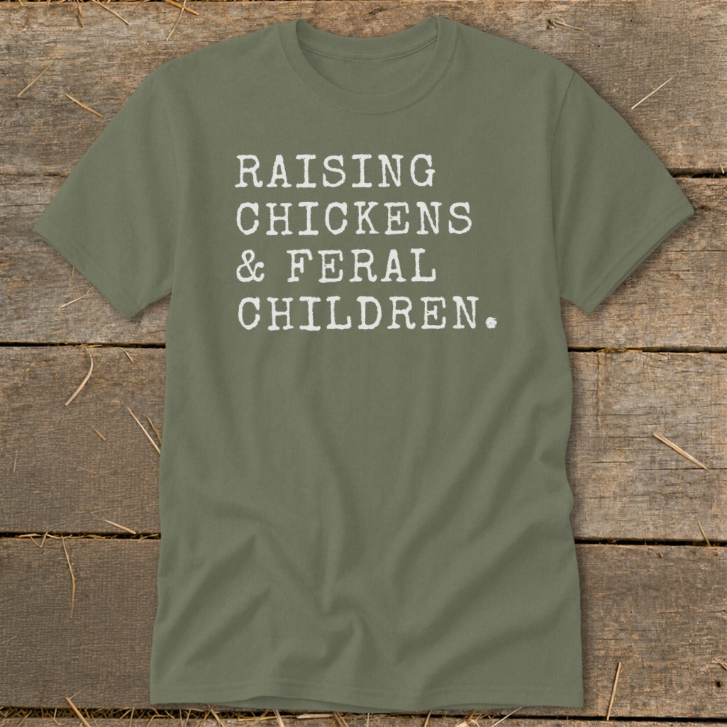 Green t-shirt with white text reading "RAISING CHICKENS & FERAL CHILDREN."