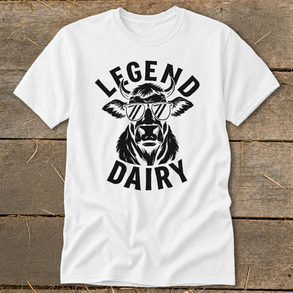 White t-shirt with black graphic of a cow wearing sunglasses and text "LEGEND DAIRY".