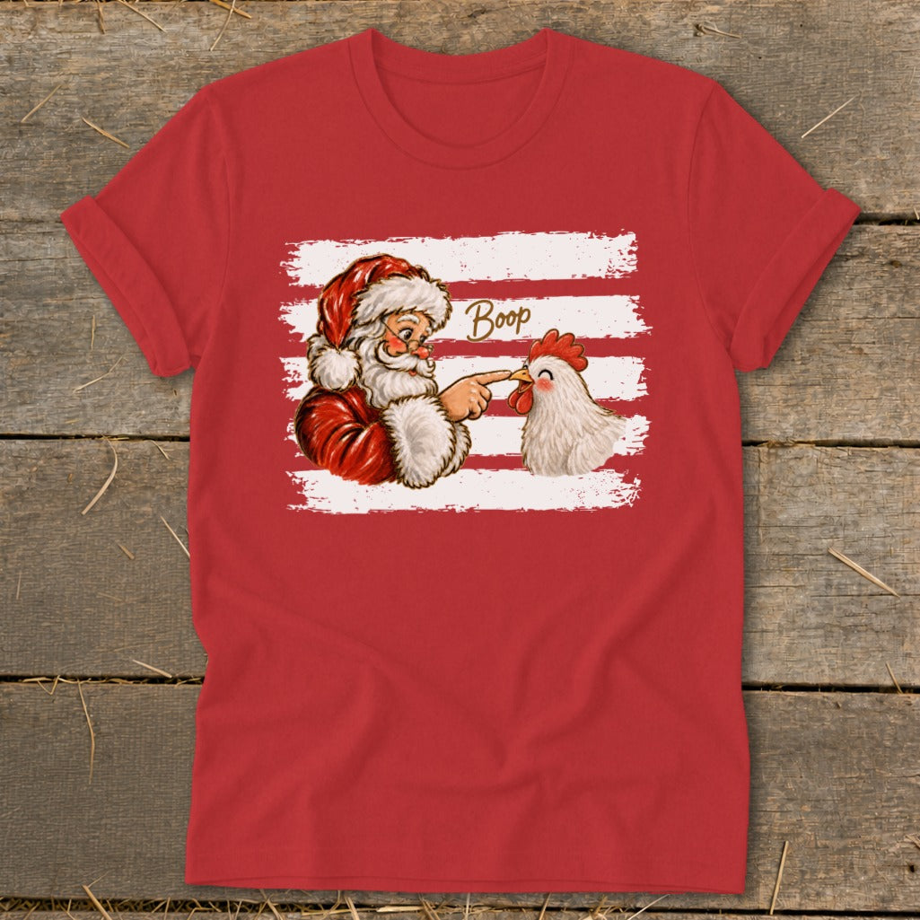 Santa booping a chicken with the word "Boop" on a red shirt.