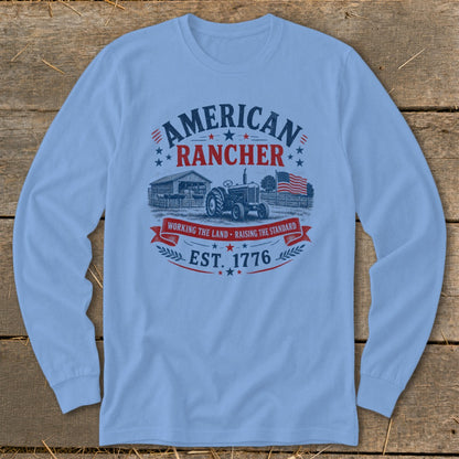 Light blue long sleeve shirt with "American Rancher Est. 1776" graphic.