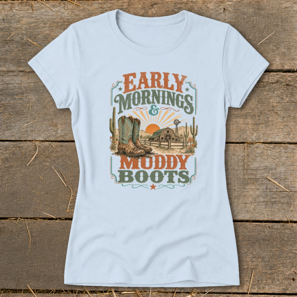 Light blue t-shirt with "Early Mornings & Muddy Boots" graphic featuring cowboy boots.
