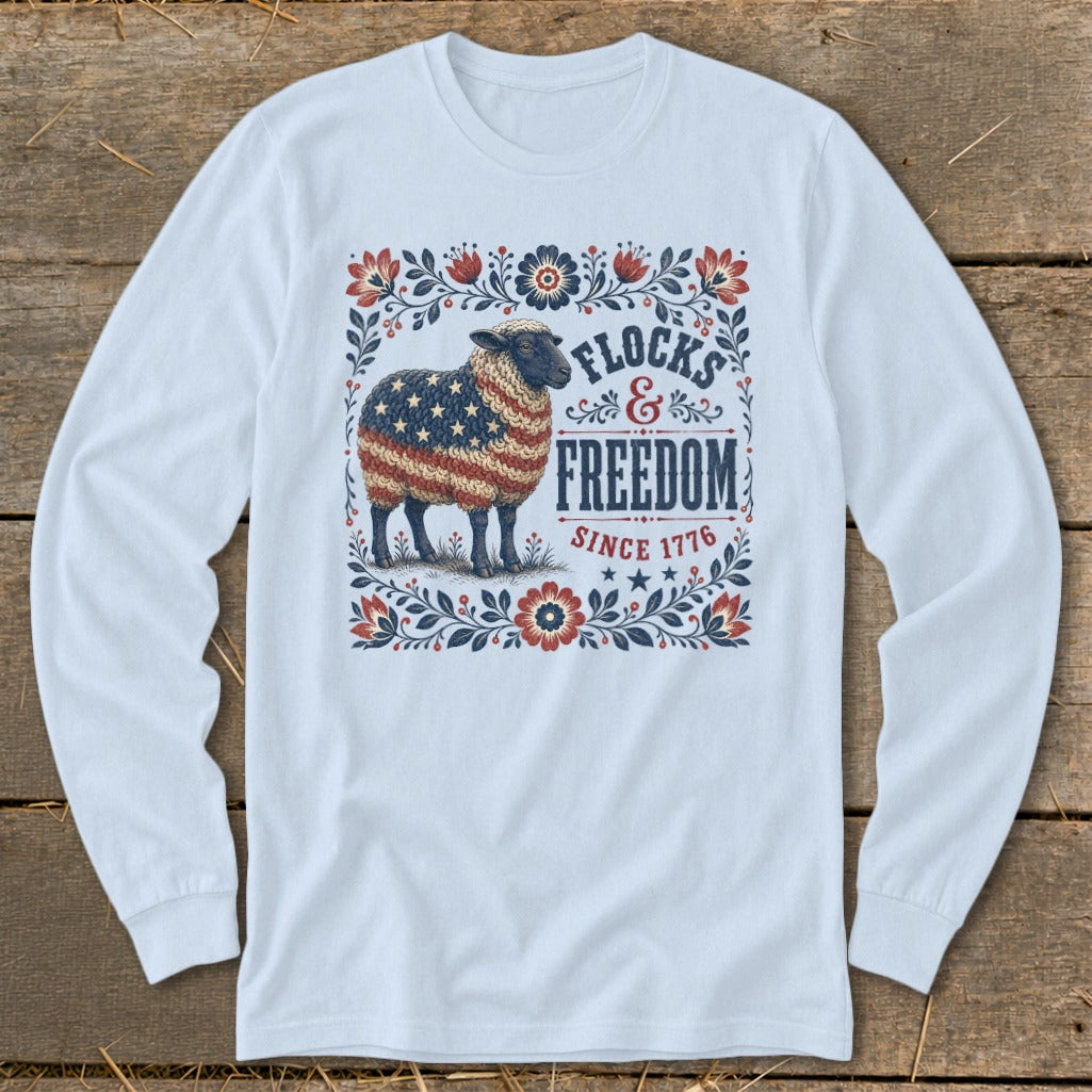 Sheep with American flag pattern on fleece, "Flocks & Freedom Since 1776" text.