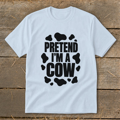 Light blue t-shirt with "Pretend I'm a Cow" text and black cow spots.