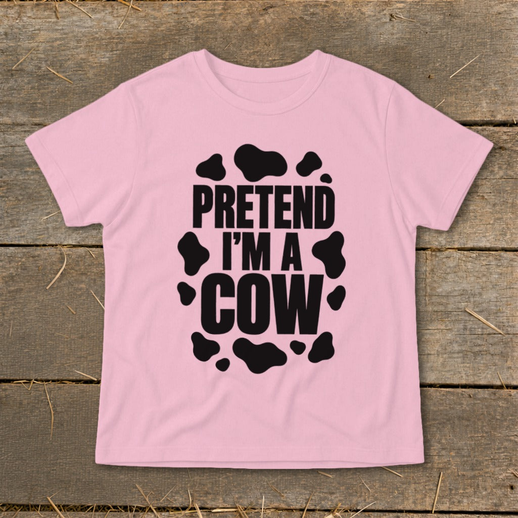 Pink t-shirt with black "PRETEND I'M A COW" text and cow spots.