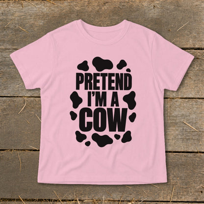 Pink t-shirt with black "PRETEND I'M A COW" text and cow spots.