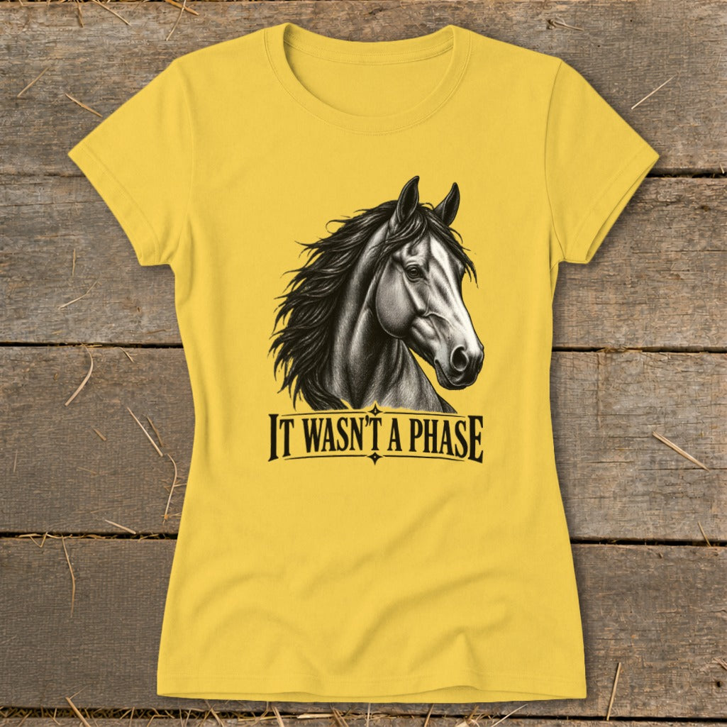 Yellow t-shirt with a sketch of a horse and the text "IT WASN'T A PHASE".