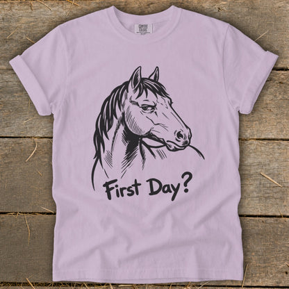 Light purple t-shirt with black horse drawing and text "First Day?".
