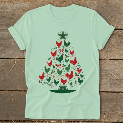 Light green t-shirt with a Christmas tree made of red and green chickens and holly.