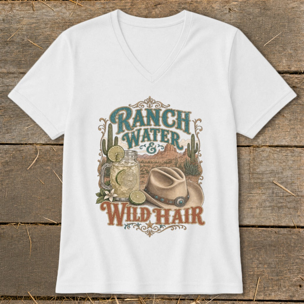 White v-neck t-shirt graphic with "Ranch Water & Wild Hair" text, drink, hat, and desert scene.