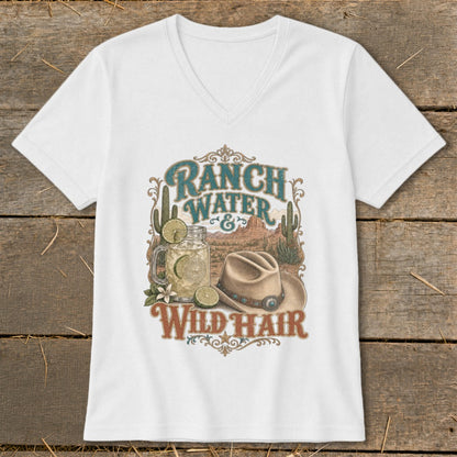 White v-neck t-shirt graphic with "Ranch Water & Wild Hair" text, drink, hat, and desert scene.
