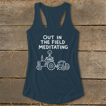 Navy tank top with "Out in the Field Meditating" and stick figure on a tractor.