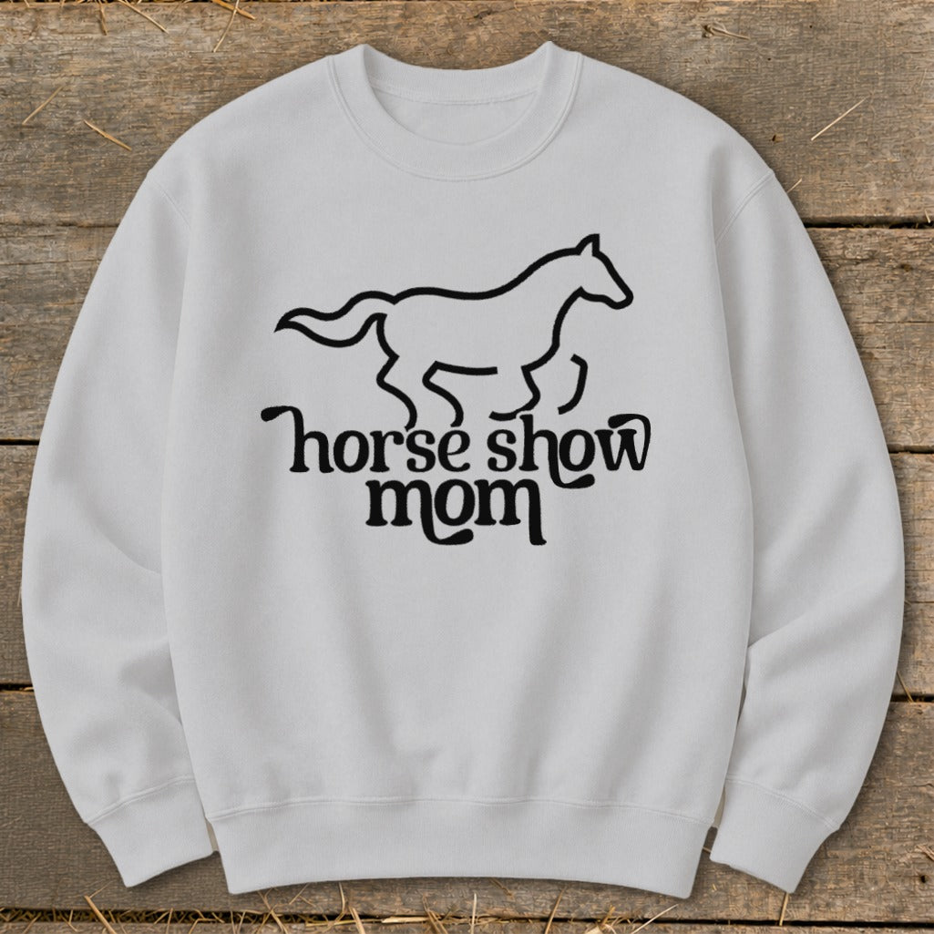 White sweatshirt with black horse graphic and "horse show mom" text.