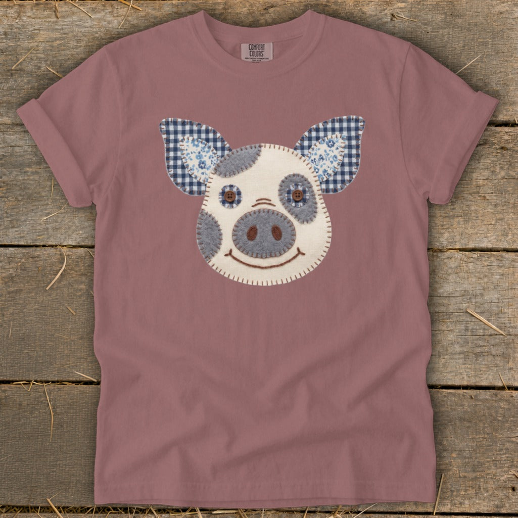 Rose t-shirt with a stitched pig face appliqué and Comfort Colors label.