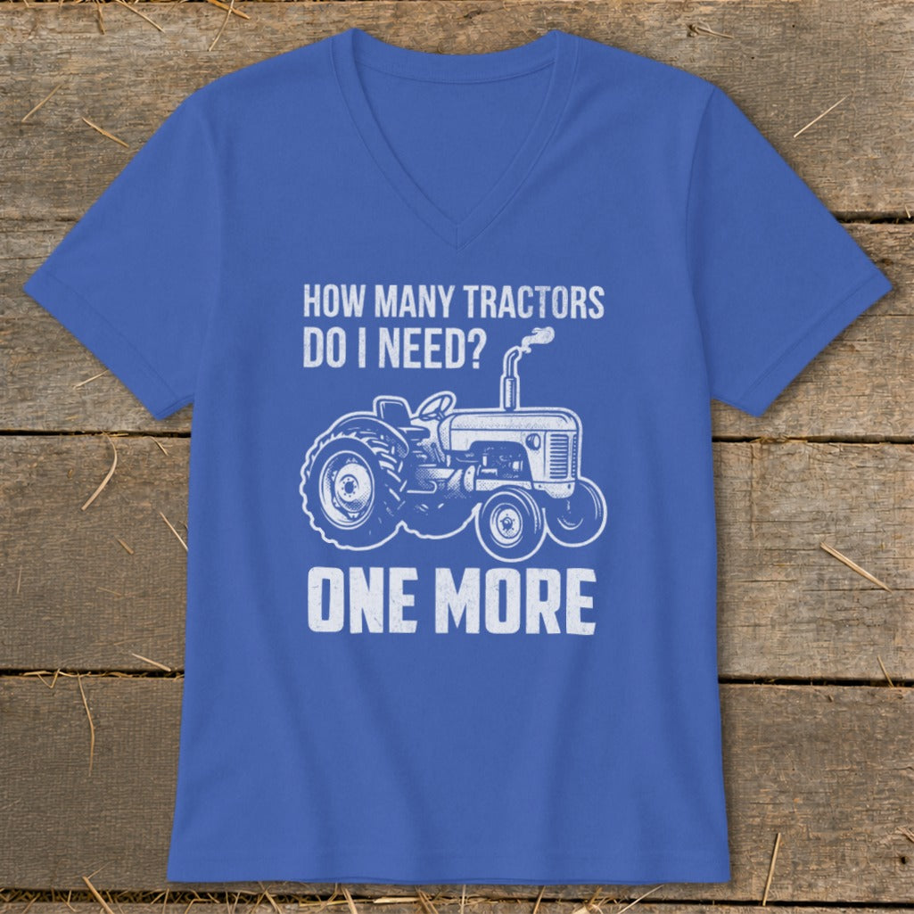 Blue t-shirt with white tractor graphic and text "How many tractors do I need? One more".