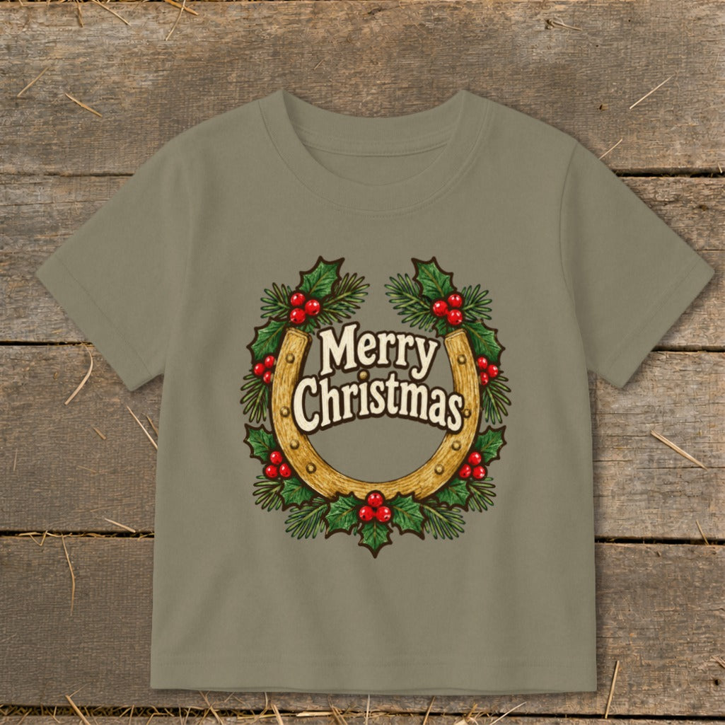 T-shirt with a horseshoe wreath and "Merry Christmas" text.
