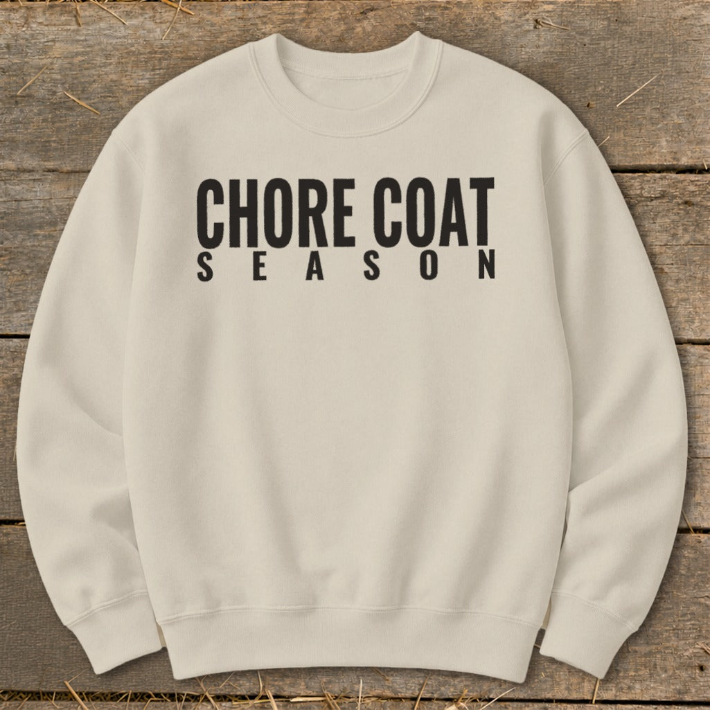 Cream sweatshirt with black text reading "CHORE COAT SEASON".