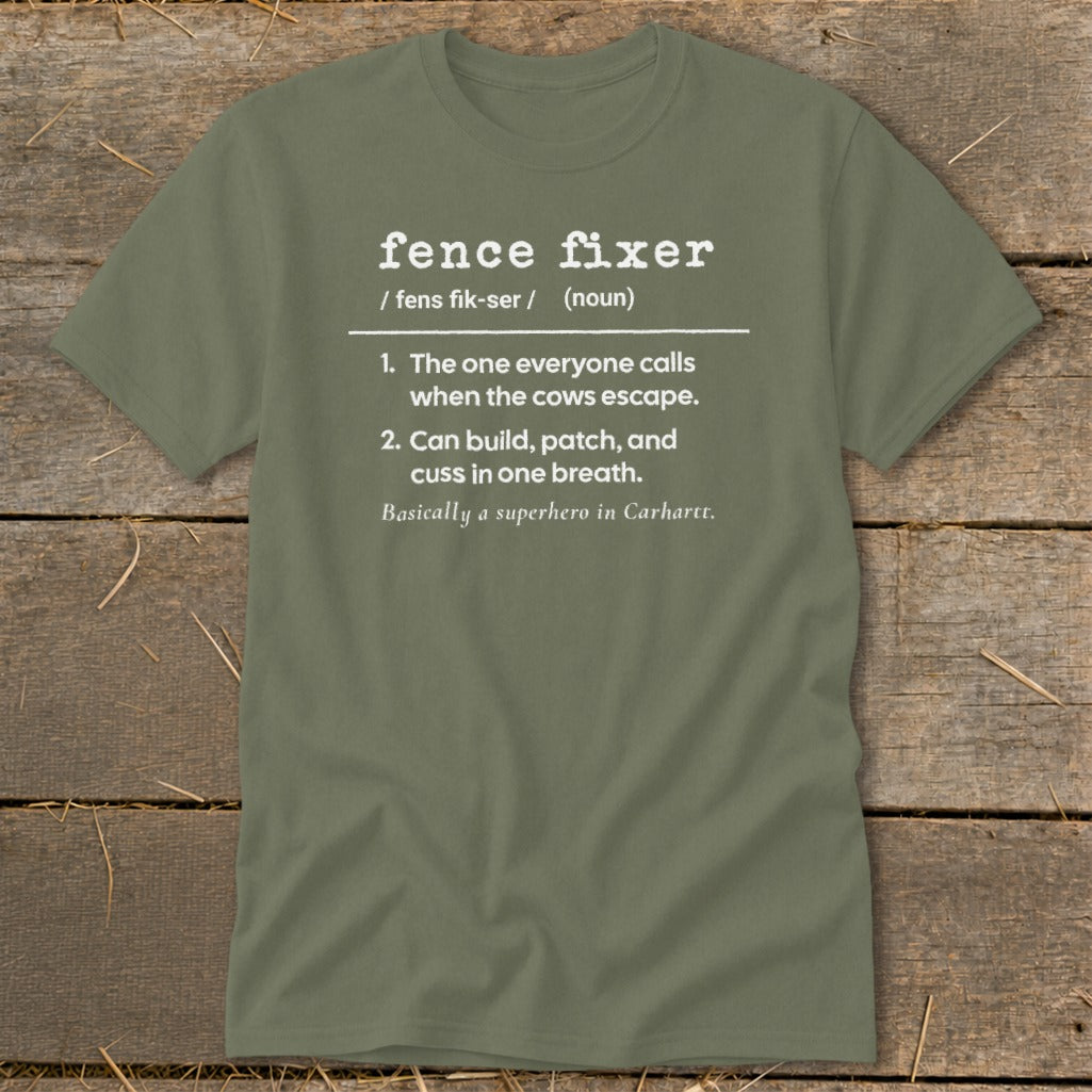 Green t-shirt with "fence fixer" definition and humorous descriptions.