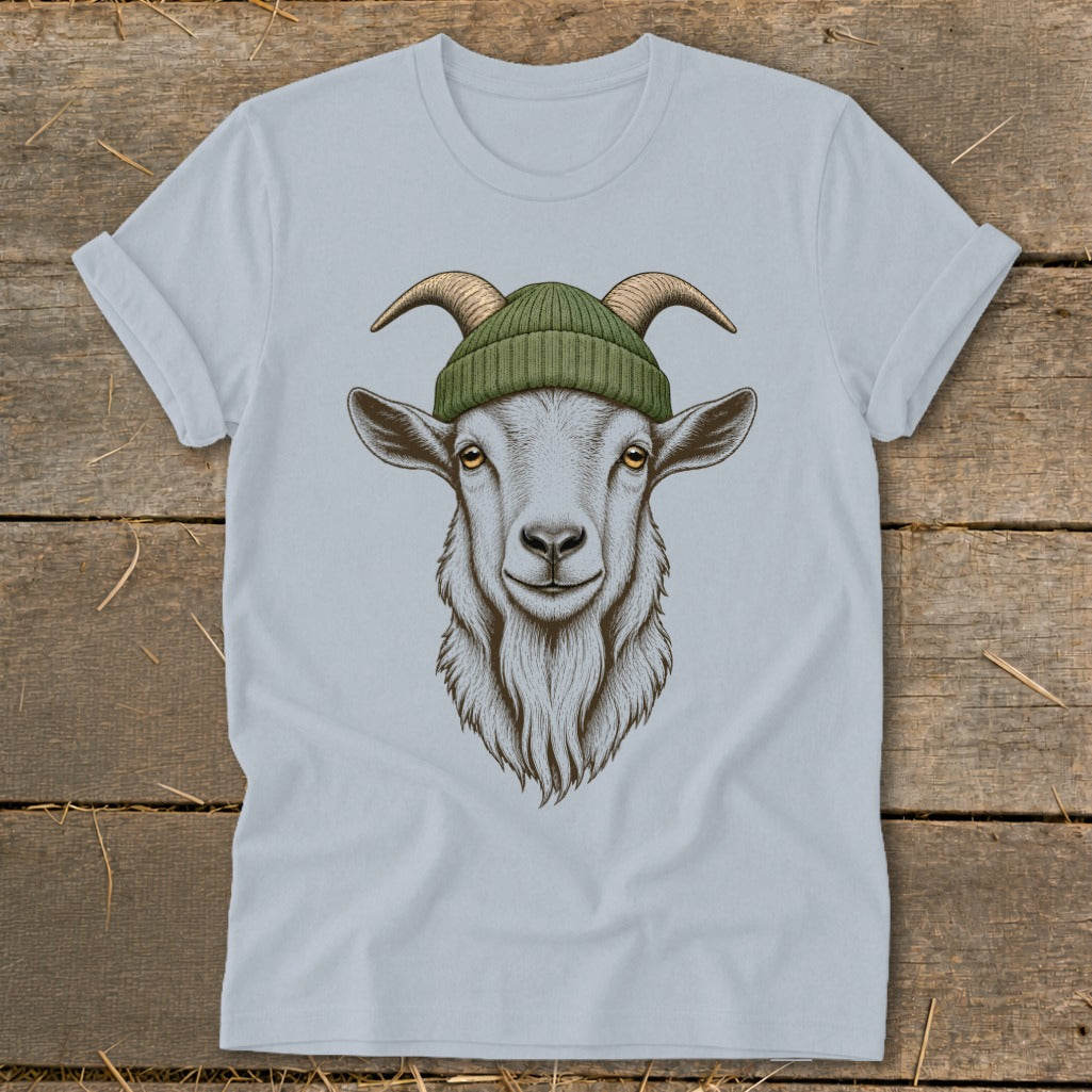 Light blue t-shirt with a drawing of a goat wearing a green beanie.