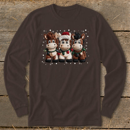 Three cartoon horses wear Christmas lights and a Santa hat, surrounded by snowflakes.