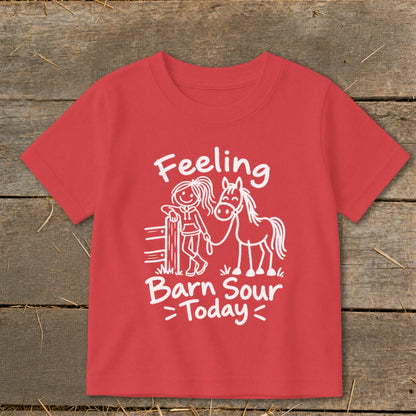 Red t-shirt with white graphic of a girl and horse with text "Feeling Barn Sour Today".