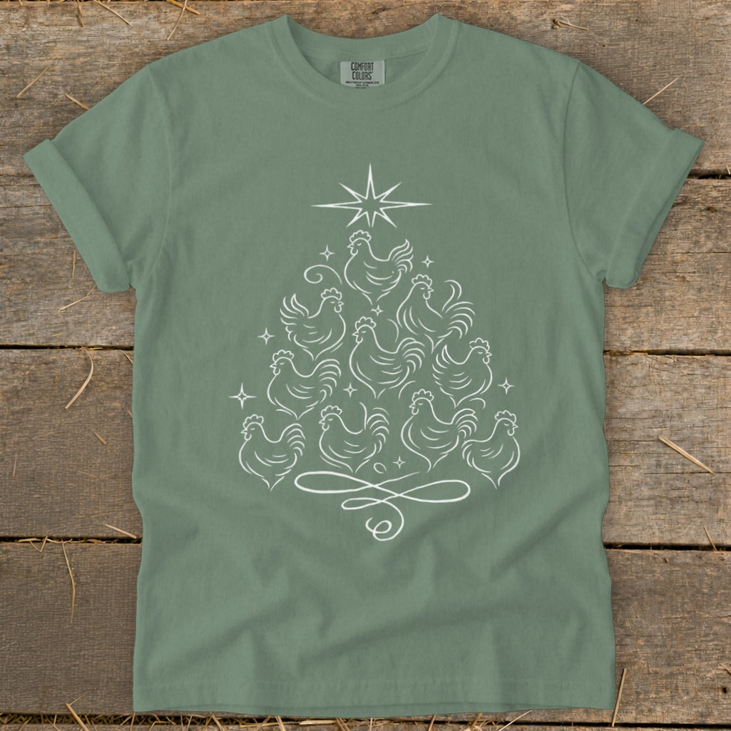 Green t-shirt with a white chicken Christmas tree graphic and star.