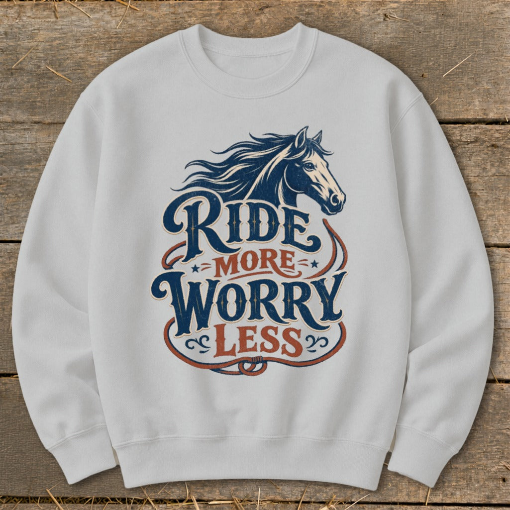 White sweatshirt with horse graphic and text "Ride More Worry Less".