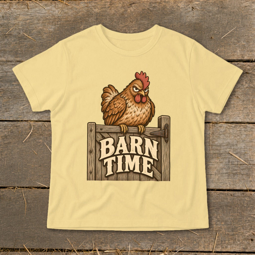 Chicken perched on wooden gate with "Barn Time" text on a light yellow t-shirt.