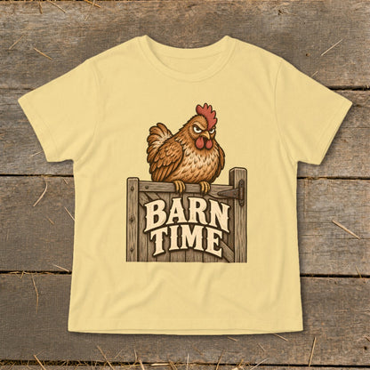 Chicken perched on wooden gate with "Barn Time" text on a light yellow t-shirt.