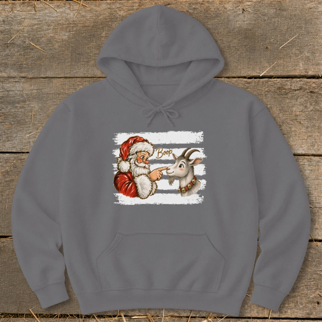 Santa booping a goat with the word "Boop" above them.