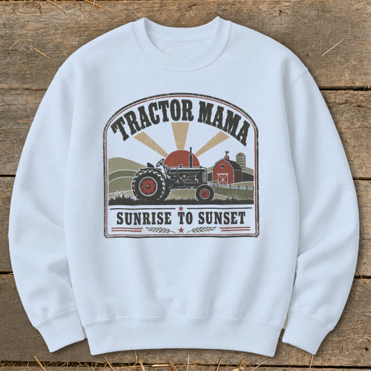 Tractor Mama graphic with tractor, barn, sun, and text "Sunrise to Sunset."