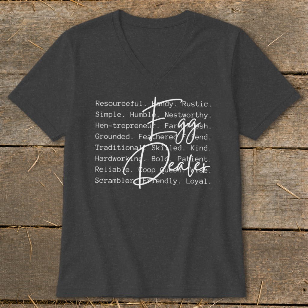 Dark grey v-neck t-shirt with "Egg Dealer" text and descriptive words.