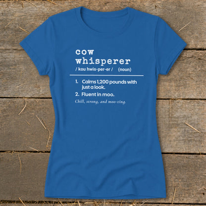 Blue t-shirt with "Cow Whisperer" definition: Calms 1,200 pounds with a look. Fluent in moo.
