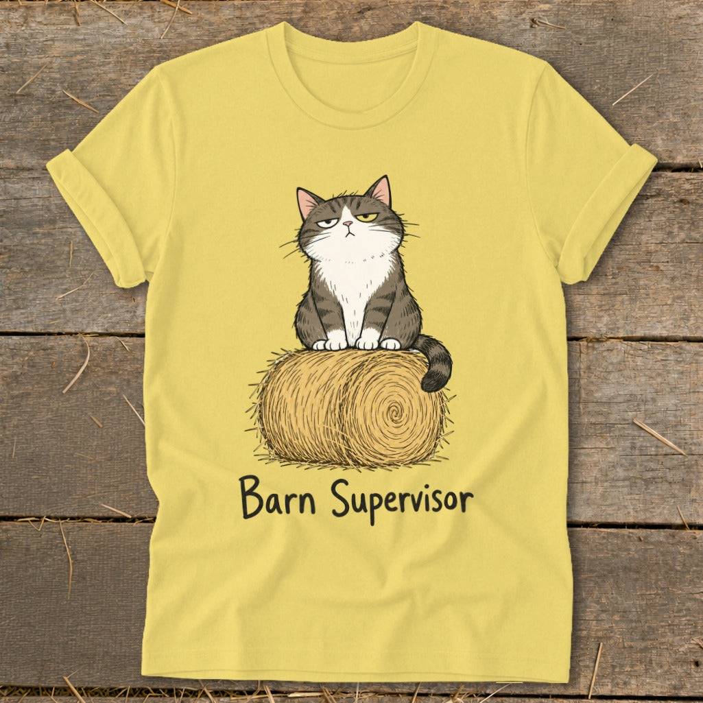 Yellow t-shirt with a grumpy cat sitting on a hay bale, text reads "Barn Supervisor".