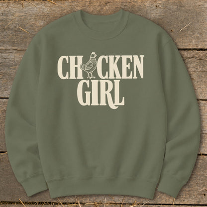 Olive green sweatshirt with white "CHICKEN GIRL" text and chicken graphic.