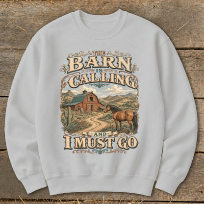 Light gray sweatshirt with "The Barn is Calling and I Must Go" text and a barn, horse, and desert landscape.