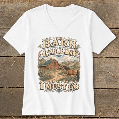 White v-neck t-shirt with "The Barn Is Calling and I Must Go" text and barn/horse graphic.