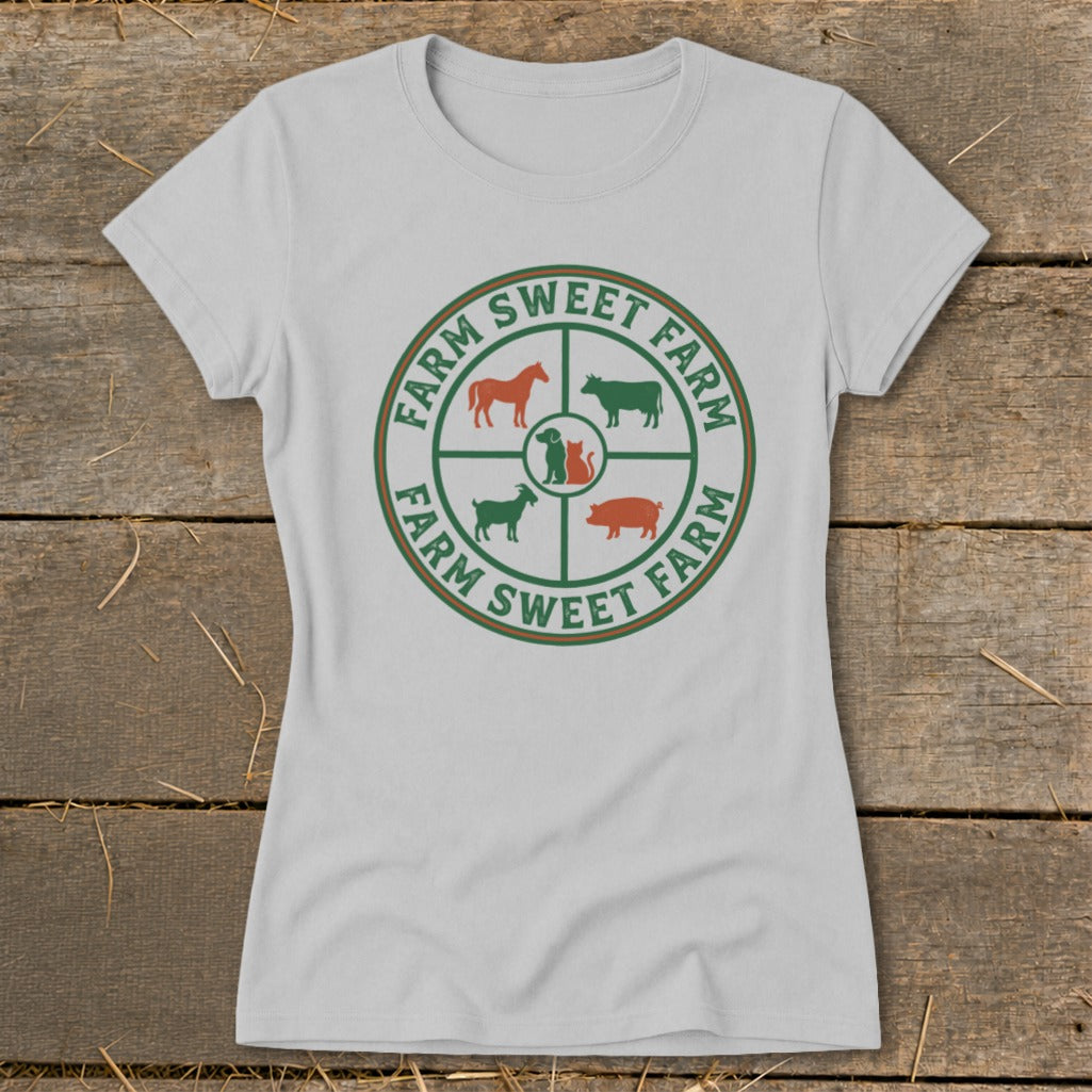 White t-shirt with circular farm animal graphic and "Farm Sweet Farm" text.
