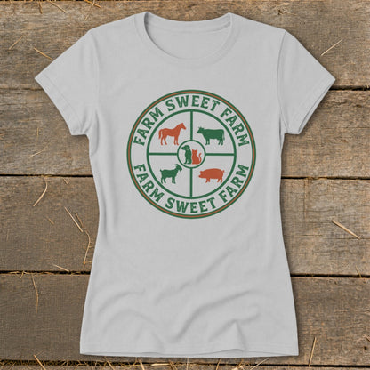 White t-shirt with circular farm animal graphic and "Farm Sweet Farm" text.
